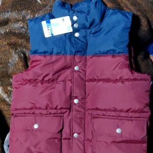 A burgundy and navy blue winter coat